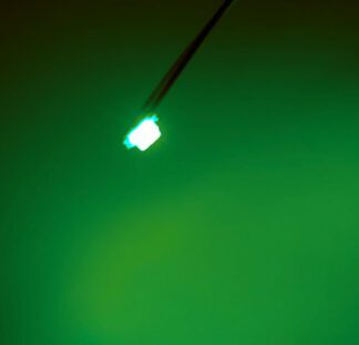 A green light is hanging from the ceiling.
